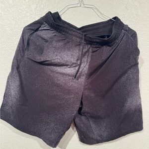 Black 7” lululemon pacebreaker shorts with liner